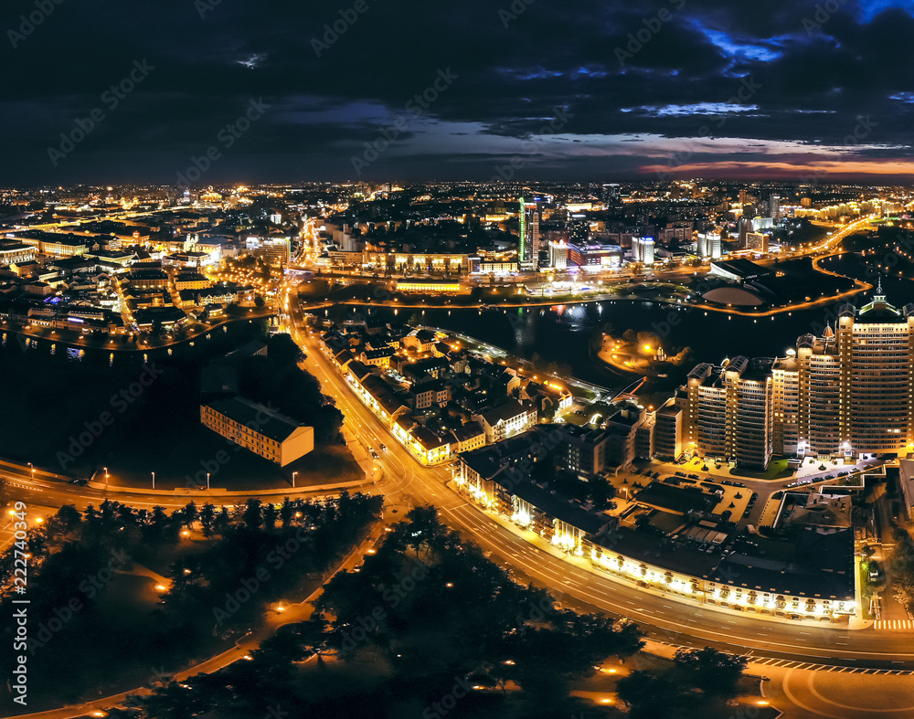 Night cityscape from birds eye view. Aerial view of Minsk City downtown at night