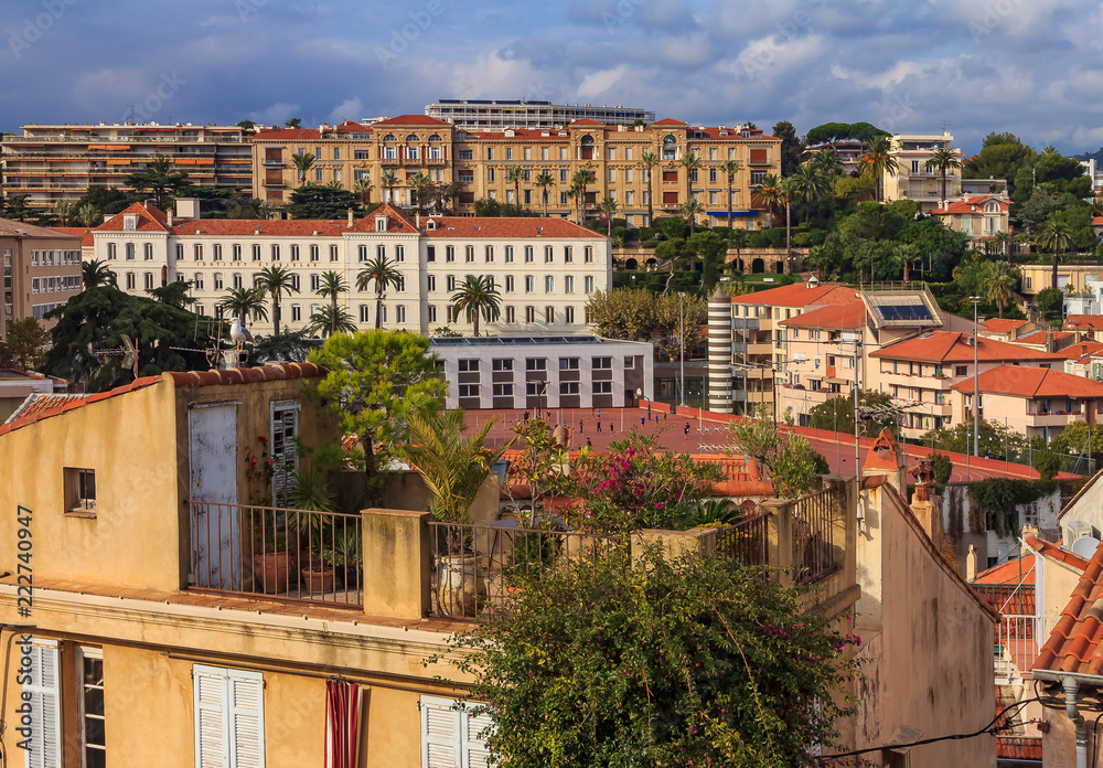 Birds-eye view of Le Suquet old town with its old buildings and red roofs in Cannes France