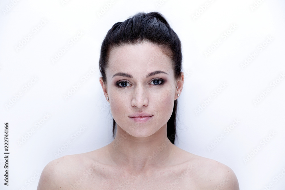 close-up portrait of a young woman's face. close-up portrait of a young woman's face.