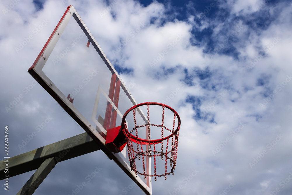 basketball basket against the sky with clouds basketball basket against the sky with clouds