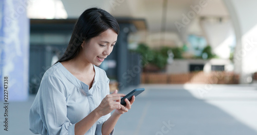 Photography Woman use of mobile phone in the city