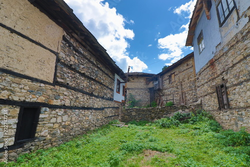 Old houses in the historical cultural reserve village of Dolen, Bulgaria. Dolen is famous with its 350 old houses – an example of 19th century Rhodopean architecture.