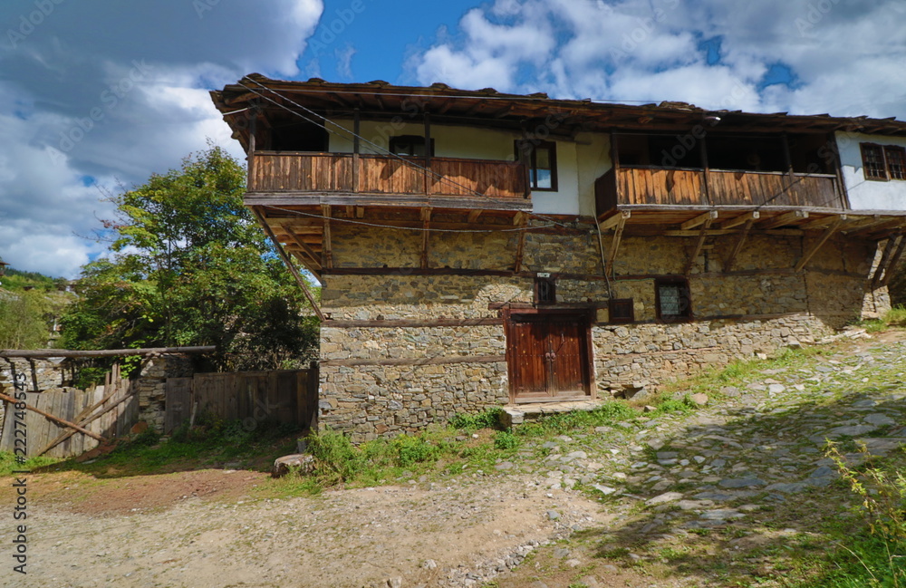 Old houses in the historical cultural reserve village of Dolen, Bulgaria. Dolen is famous with its 350 old houses – an example of 19th century Rhodopean architecture. 