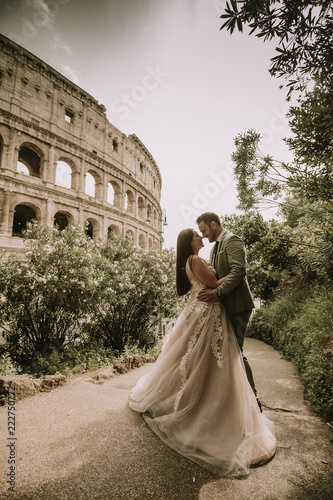 Wedding couple near  Coloss...