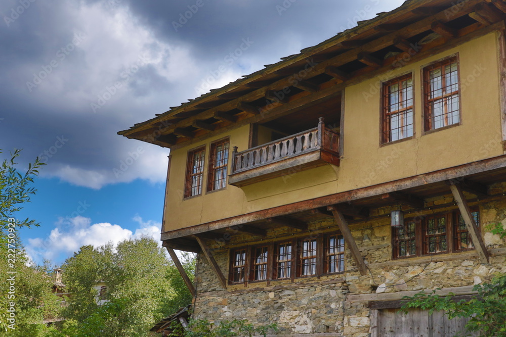 Old houses in the historical cultural reserve village of Dolen, Bulgaria. Dolen is famous with its 350 old houses – an example of 19th century Rhodopean architecture.
