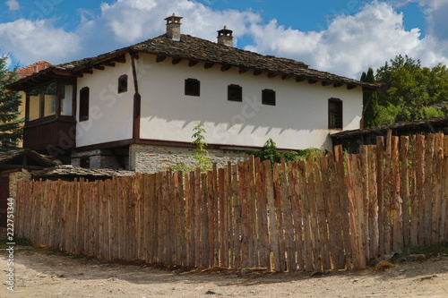 Old houses in the historical cultural reserve village of Dolen, Bulgaria. Dolen is famous with its 350 old houses – an example of 19th century Rhodopean architecture. photo