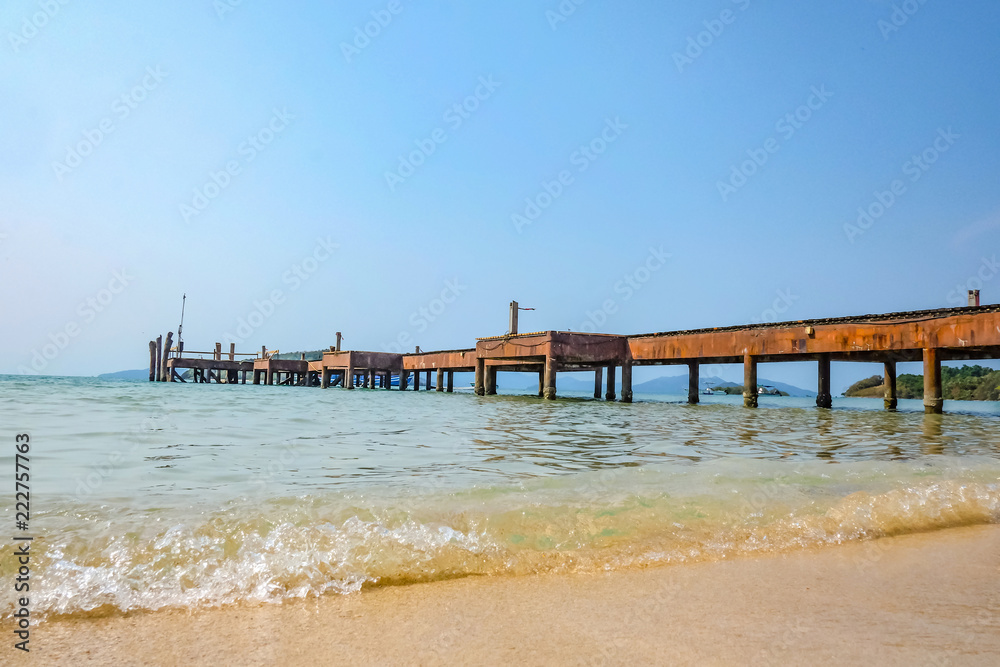 Wooden pier on the amazing idyllic beach and tropical ocean in koh mak island trat thailand