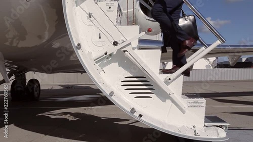 passengers board an jet aircraft in airport