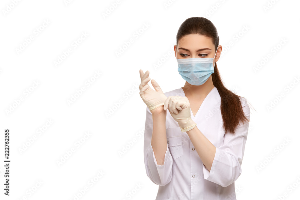 woman doctor in rubber gloves isolated on white woman doctor in rubber gloves isolated on white