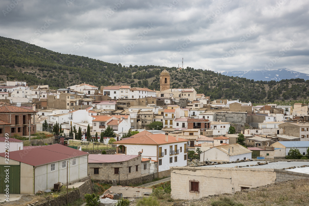 a view over Ferreira town on a cloudy day, province of Granada, Andalusia, Spain