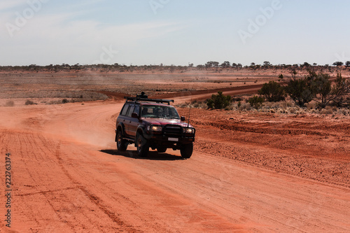4wd off road van on red soil Outback Australia