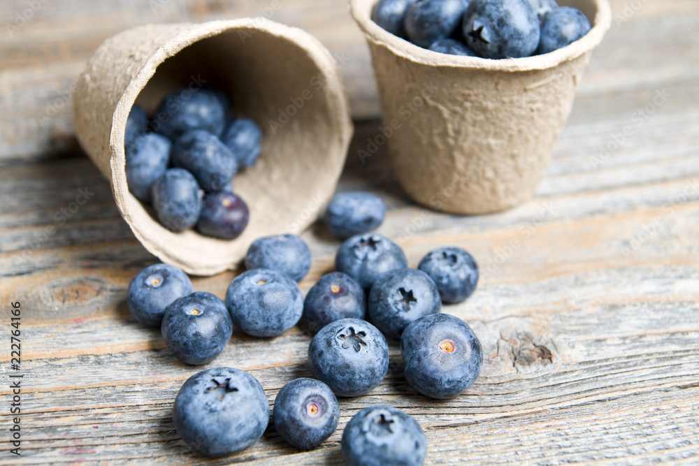 Delicious blueberries on wood