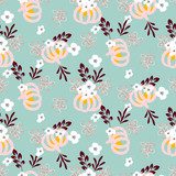Autumn beautiful chic seamless vector pattern with pumpkins and flowers on blue background. Feminine style.