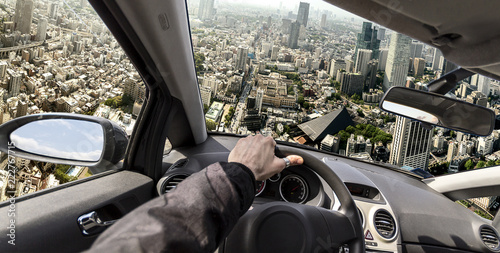 Obraz na plátně driving a flying car to  bypass traffic, photo manipulation