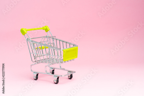 Collection of shopping cart full of shopping time.Top view or flat lay composition cart on color background.online shopping concept.
