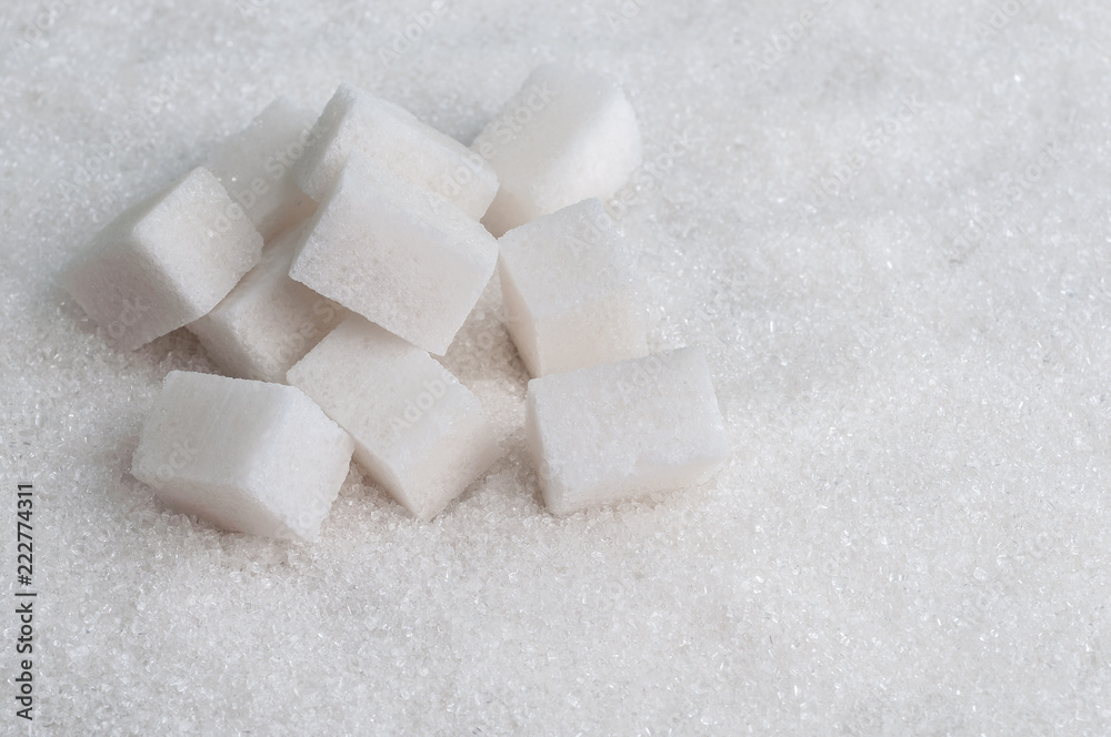 Sugar cubes on white sugar background Sugar cubes on white sugar background