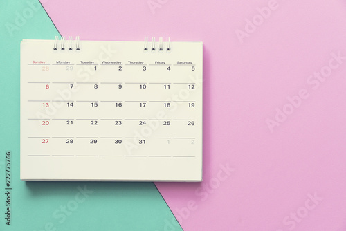 close up of calendar on the colorful table, planning for business meeting or travel planning concept