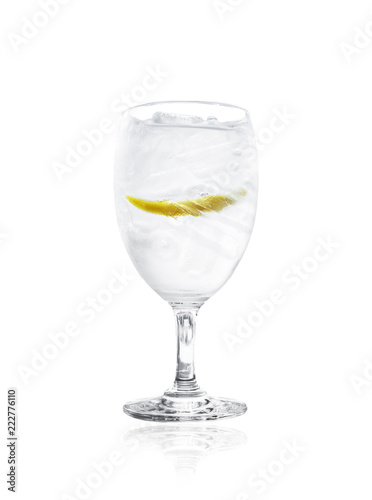 Lemon in wine glass white background 