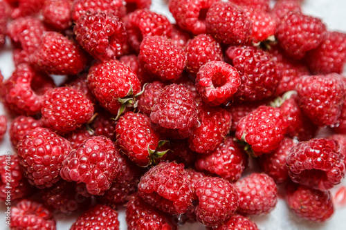 Fresh and sweet raspberries background