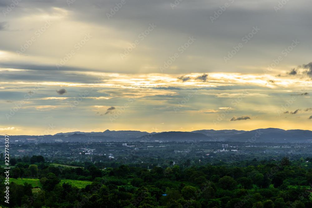 Landscape of cloudy, mountain and forest with sunset in the evening from top view.