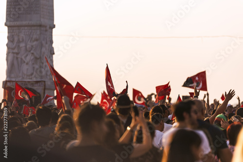 Turkish flag in crowded people. photo