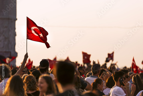 Bild auf Leinwand Turkish flag in crowded people.