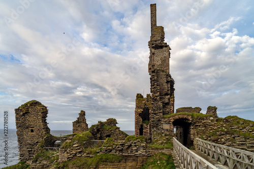 Castle Sinclair Girnigoe from Sinclair`s Bay. The medieval and renaissance fortress is the most spectacular ruin in the North of Scotland, in the Highlands near Wick and Caithness photo