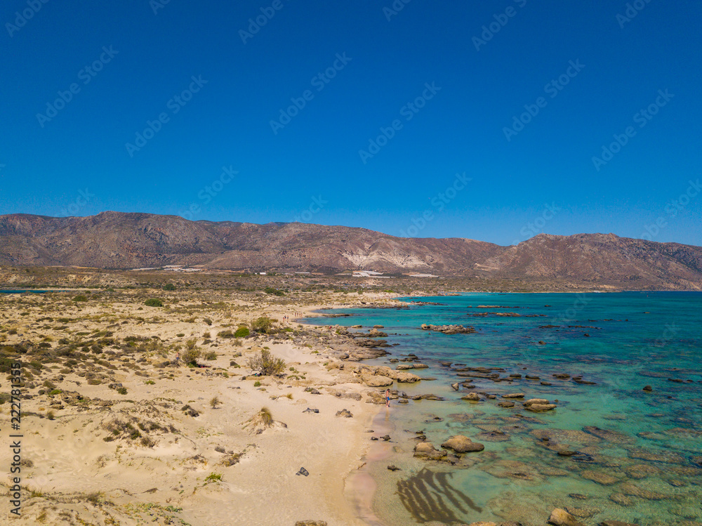 Aerial view to the beautiful beach and island of Elafonisi lagoon. Amazing wallpaper, photo from drone. Crete, Greece.