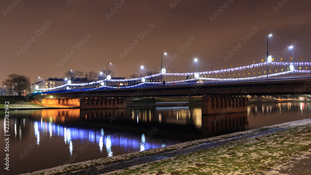 Christmas decorations on the Grunwaldzki bridge in Krakow - obrazy, fototapety, plakaty 