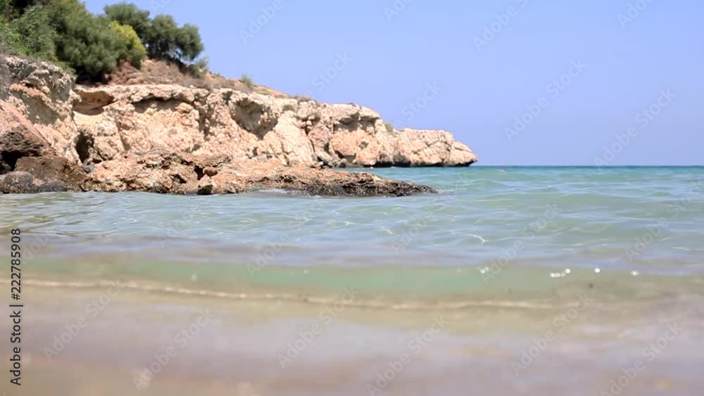 Waves of the Mediterranean Sea on the beach of Cyprus, rocky coast Waves of the Mediterranean Sea on the beach of Cyprus, rocky coast