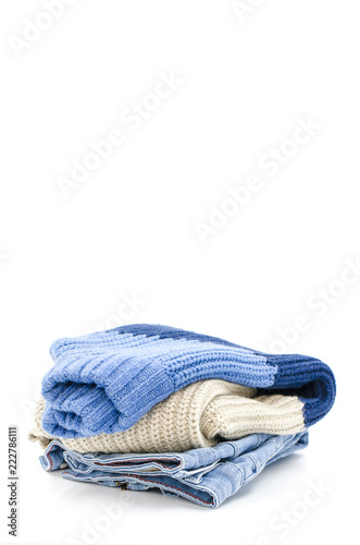 A pile of clothes is on a white background