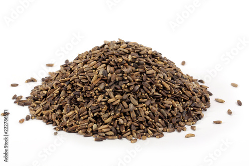 Seeds of a milk thistle on white background