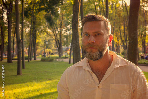 Man with a beard in the park, portrait
