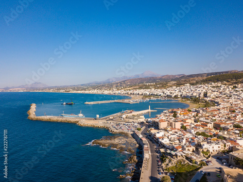 Fototapeta Naklejka Na Ścianę i Meble -  Aerial view of Rethymno harbor and city center. Rethymnon is venetian style city in Crete, Greece