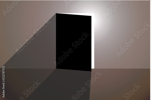 Habitación oscura con luz entrando por una puerta entre abierta.