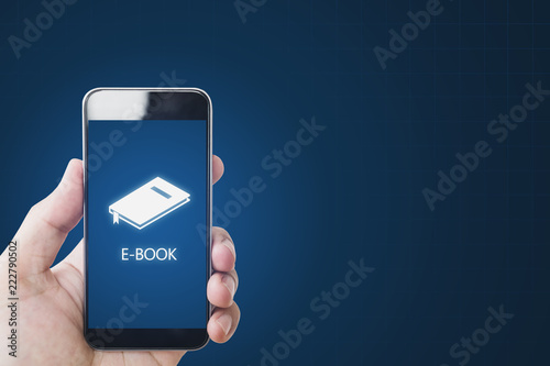 E-book on on mobile smart phone, hand using e-book on mobile device. Online education, e-learning and e-book concept