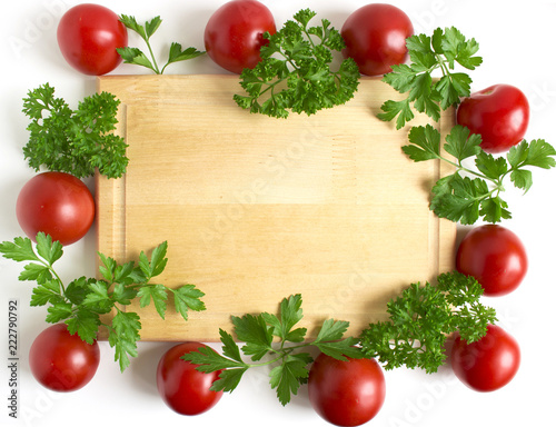 A frame of tomatoes and parsley