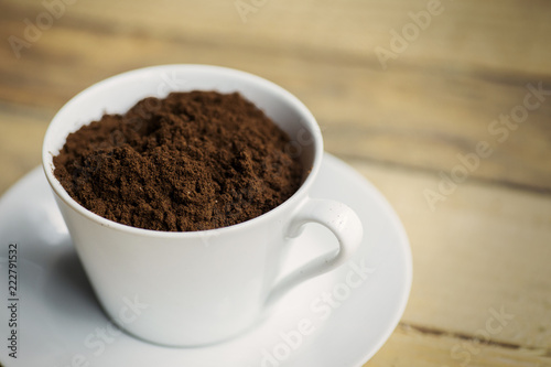 Picture of ground coffee in white cup