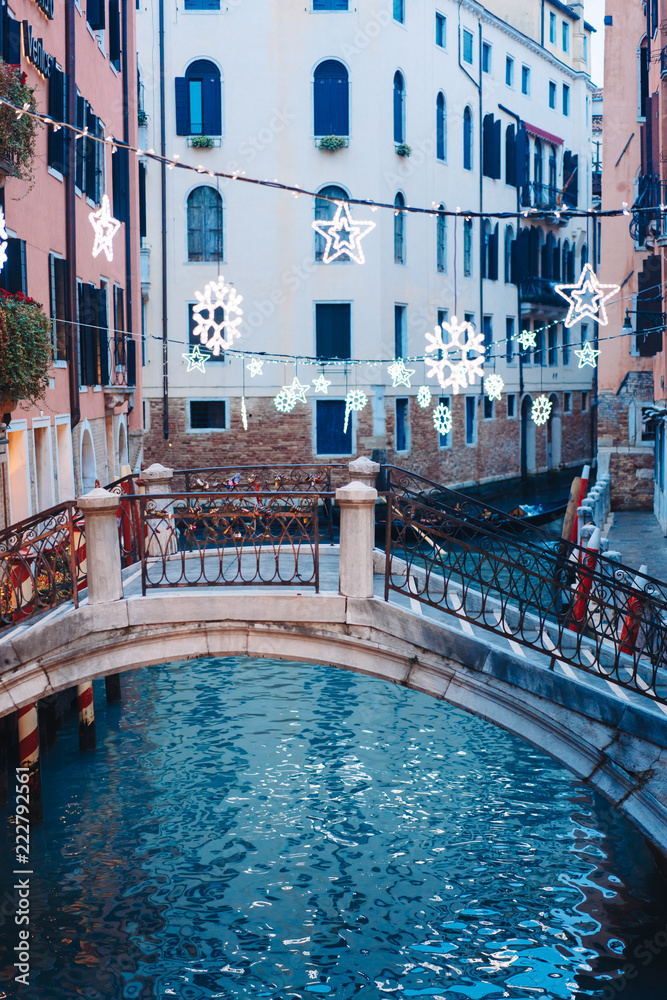Gondolas on lateral narrow Canal, Venice, Italy.