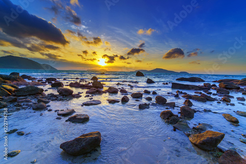 Beautiful colours of clouds and sky during sunrise at Rawai beach, Phuket © Netfalls