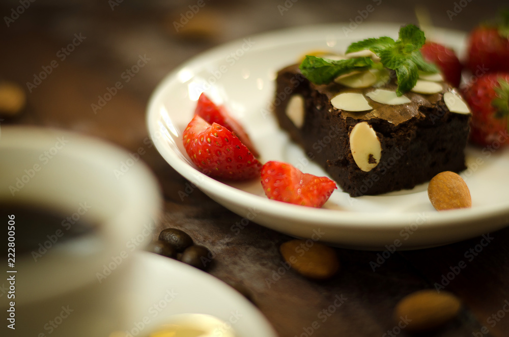 Chocolate brownie, strawberry and coffee with casual day Chocolate brownie, strawberry and coffee with casual day