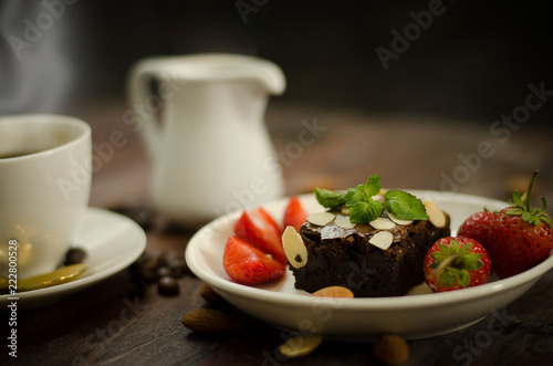 Chocolate brownie, strawberry and coffee with casual day