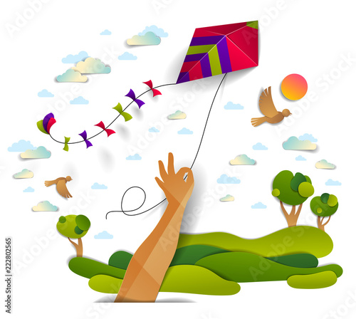 Hand holding kite over cloudy sky birds flying and sun, meadows and trees scenic nature landscape, freedom and easiness emotional concept, vector modern style paper cut 3d illustration.