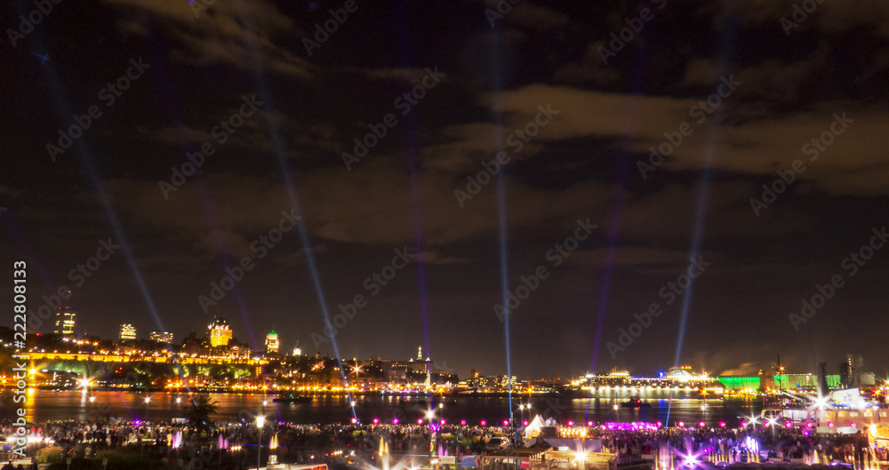 Long Exposure - Quebec cityscape during the evening/night with lot of lights and the peaceful Saint-Lawrence River.
