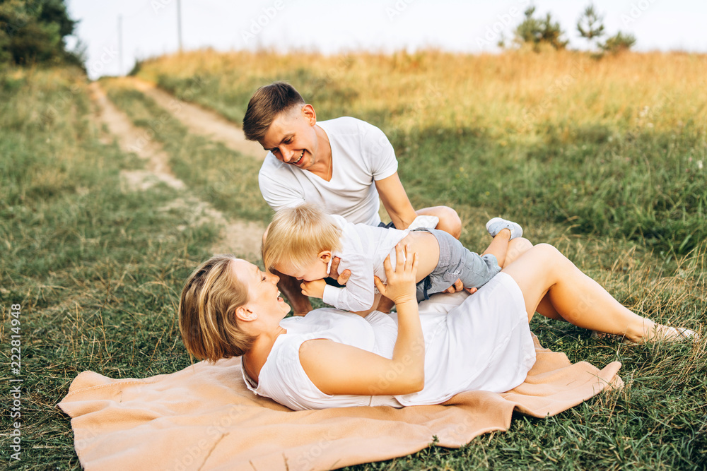 Young family with little son have fun outdoor Young family with little son have fun outdoor