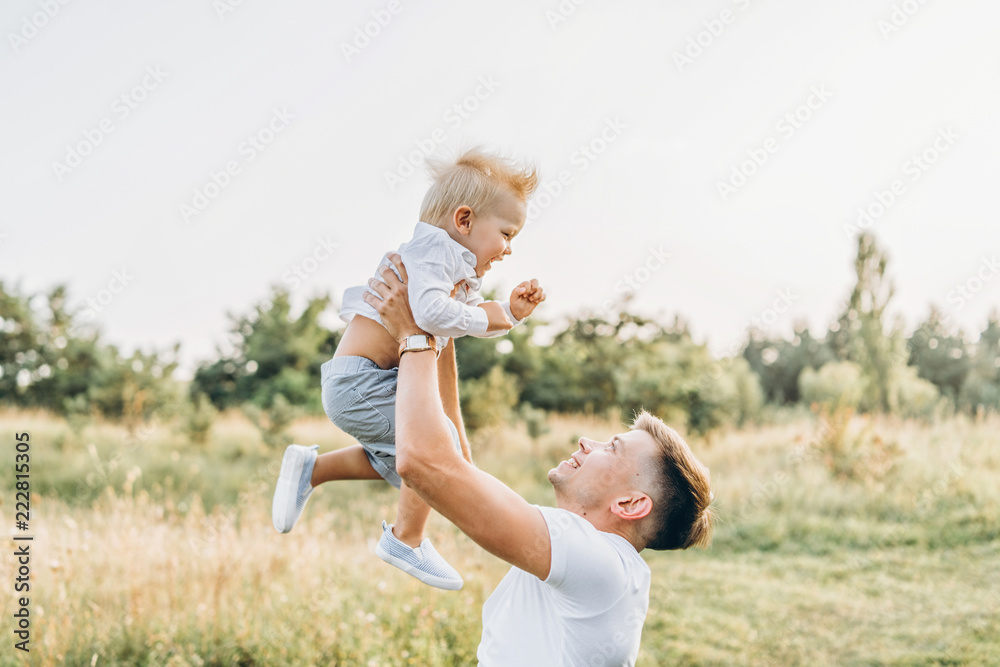 Fototapeta premium Father and his little son have fun outdoor
