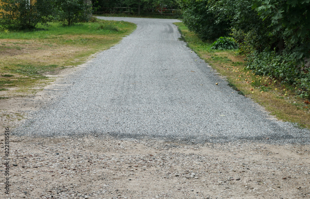 Asphalt and gravel road.