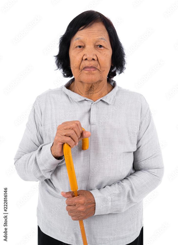 senior woman with a walking cane isolated on white background senior woman with a walking cane isolated on white background