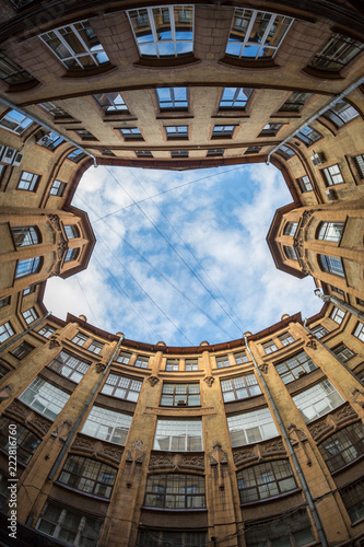 Ancient hight courtyards sky round St. Petersburg
