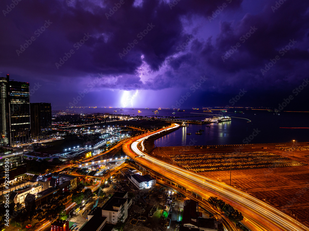 beautiful Lightning and light trail in highway at Singapore beautiful Lightning and light trail in highway at Singapore